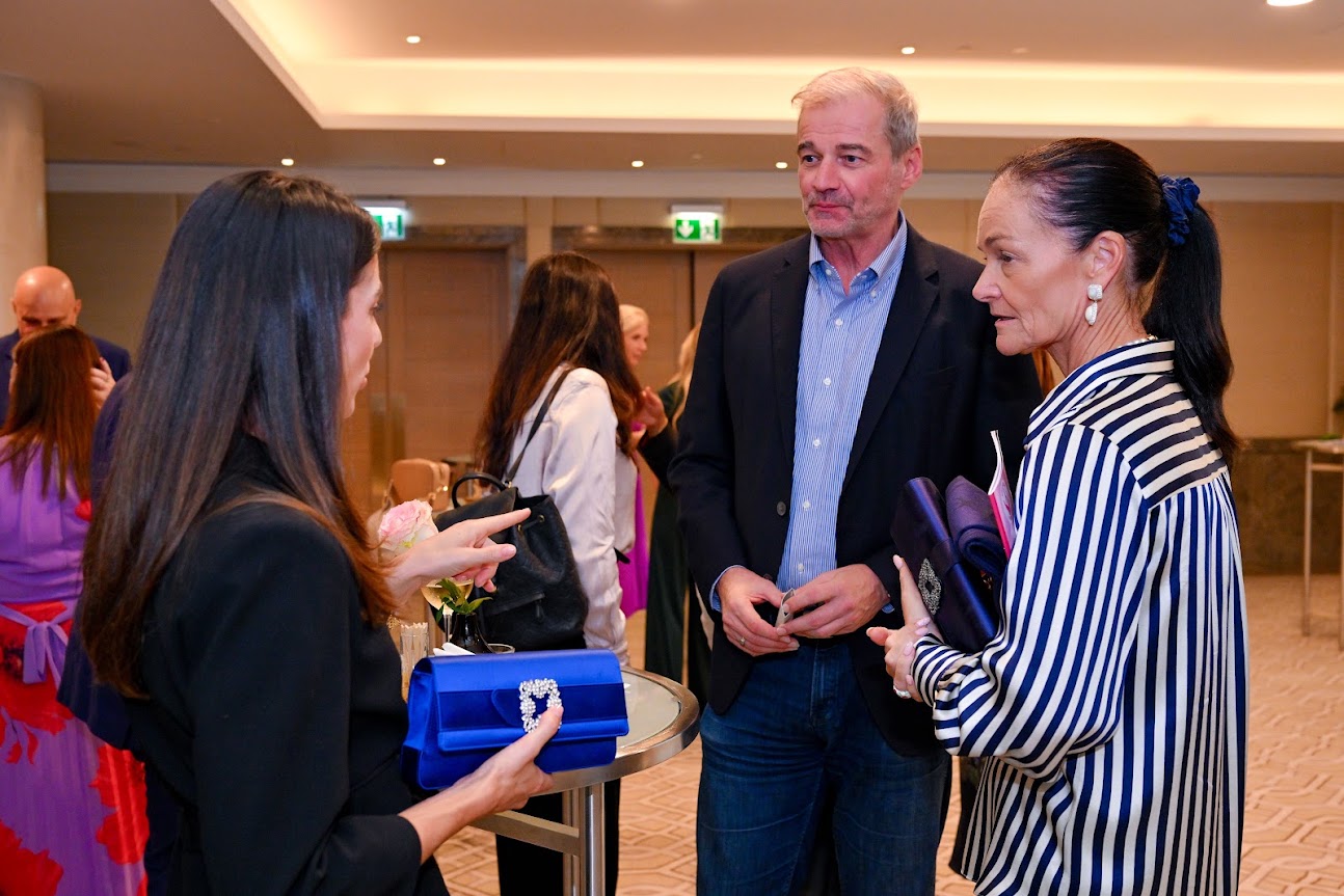 Guests in conversation at the PinkRibbon International UAE event reception